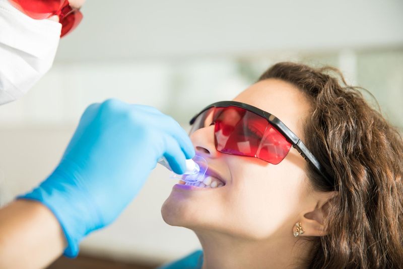 women have teeth whitening operation in dental clinic Antalya
