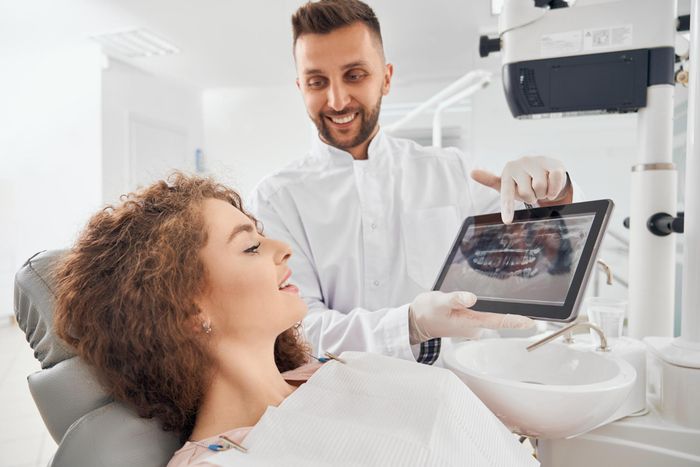 dentist examine patient teeth before dental curettage treatment in turkey