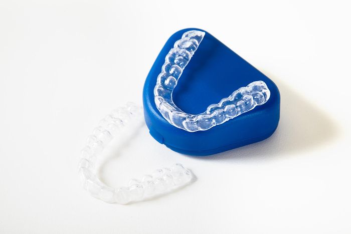 invisalign aligners are on the blue floor