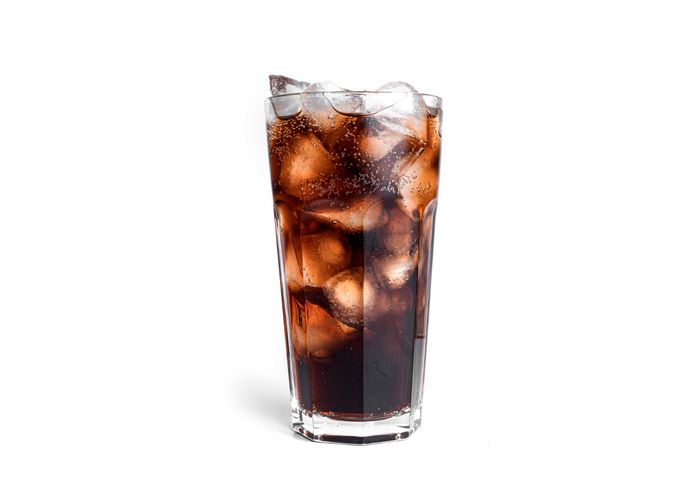 Cola in a Glass which can damage the teeth  